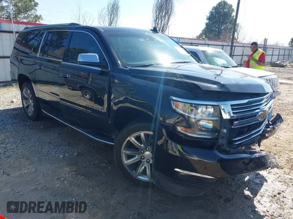 2019 Chevrolet Suburban Premier with VIN 1GNSCJKC5KR360318, listed as a IAAI auction lot 41504344 with 82,997 mi miles and . Bid and sale history available at DreamBid. Image 1.