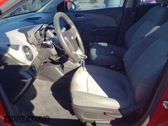 2012 Chevrolet Sonic LS with VIN 1G1JB6SH9C4126979, listed as a Copart auction lot 88278845 with 122,047 mi miles and Clean title. Bid and sale history available at DreamBid. Image 7.