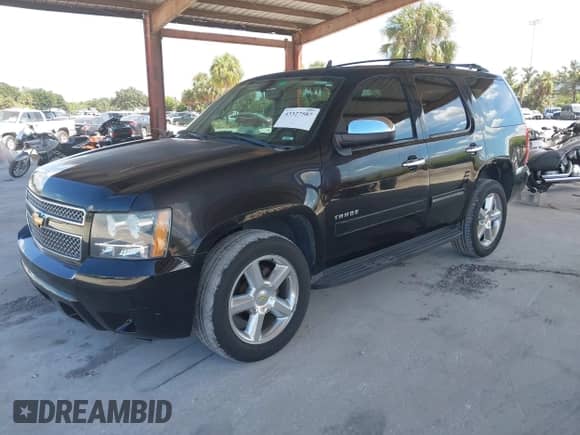 2012 Chevrolet Tahoe LS with VIN 1GNSCAE04CR227746, listed as a IAAI auction lot 43327587 with 232,116 mi miles and . Bid and sale history available at DreamBid. Image 2.