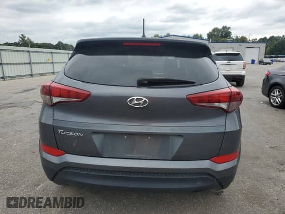 2018 Hyundai Tucson SE with VIN KM8J23A43JU808897, listed as a Copart auction lot 80994965 with Not provided miles and Salvage title. Bid and sale history available at DreamBid. Image 6.