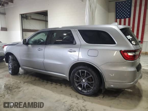 2016 Dodge Durango R/T with VIN 1C4SDJCT5GC341265, listed as a Copart auction lot 82257175 with 105,859 mi miles and Salvage title. Bid and sale history available at DreamBid. Image 2.