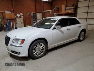 2014 Chrysler 300 C с VIN 2C3CCAKG0EH235879, выставлен на аукционе Copart как лот 57498275 с пробегом 203 450 миль миль и Списание • Salvage title. История ставок и продаж доступна на DreamBid. Изображение 1.
