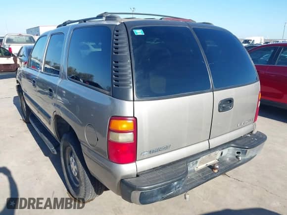 2001 Chevrolet Tahoe LS with VIN 1GNEC13T61J255280, listed as a IAAI auction lot 41663698 with 298,456 mi miles and . Bid and sale history available at DreamBid. Image 3.
