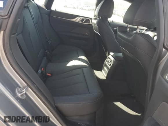 2025 BMW i4 xDrive40 with VIN WBY43HD05SFU20563, listed as a Copart auction lot 85369775 with 3,356 mi miles and Salvage title. Bid and sale history available at DreamBid. Image 10.