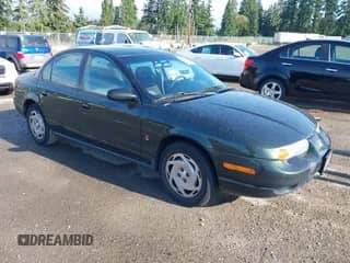 2000 Saturn SL with VIN 1G8ZK5271YZ165467, listed as a IAAI auction lot 42367156 with 185,962 mi miles and . Bid and sale history available at DreamBid. Image 1.