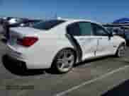 2015 BMW 7 Series 750i with VIN WBAYA8C53FG197751, listed as a Copart auction lot 56249135 with 98,514 mi miles and Salvage title. Bid and sale history available at DreamBid. Image 3.