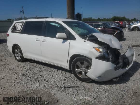 2014 Toyota Sienna LE AAS with VIN 5TDKK3DC5ES480016, listed as a Copart auction lot 70772115 with 164,920 mi miles and Salvage title. Bid and sale history available at DreamBid. Image 4.
