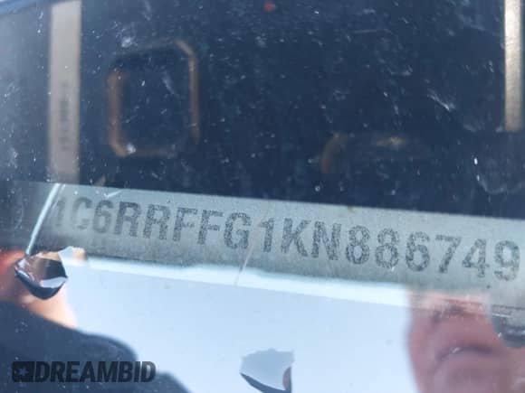 2019 Ram 1500 Big Horn z VIN 1C6RRFFG1KN886749, wystawiony jako IAAI lot #40547666 z przebiegiem 56 146 mil mil oraz . Historia ofert i sprzedaży dostępna na DreamBid. Obrazek 9.