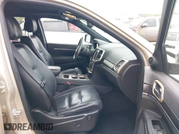 2014 Jeep Grand Cherokee Limited z VIN 1C4RJEBG3EC464031, wystawiony jako IAAI lot #43195288 z przebiegiem 123 706 mil mil oraz . Historia ofert i sprzedaży dostępna na DreamBid. Obrazek 5.