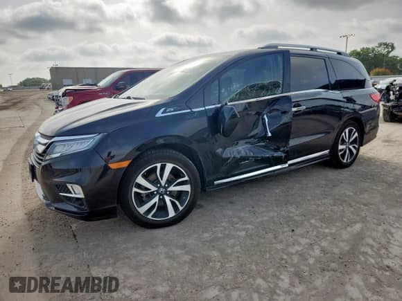 2020 Honda Odyssey Elite with VIN 5FNRL6H94LB033903, listed as a Copart auction lot 65235645 with 70,559 mi miles and Salvage title. Bid and sale history available at DreamBid. Image 1.