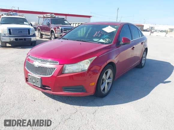2013 Chevrolet Cruze 2LT z VIN 1G1PE5SB2D7188747, wystawiony jako IAAI lot #42998393 z przebiegiem 206 910 mil mil oraz . Historia ofert i sprzedaży dostępna na DreamBid. Obrazek 2.