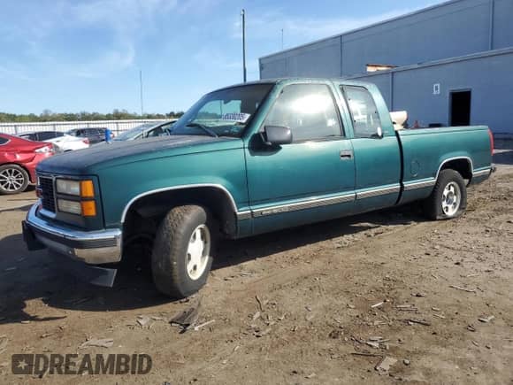 1998 GMC Sierra 1500 z VIN 2GTEC19M9W1555549, wystawiony jako Copart lot #85330205 z przebiegiem 92 604 mil mil oraz Czysty tytuł • Clean title. Historia ofert i sprzedaży dostępna na DreamBid. Obrazek 1.