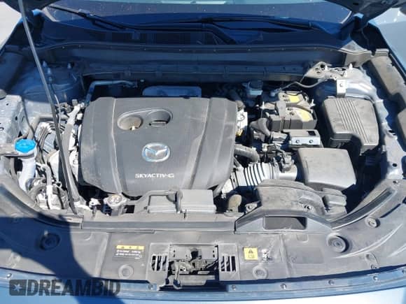 2023 Mazda CX-5 S Preferred z VIN JM3KFBCM4P0289418, wystawiony jako IAAI lot #43404635 z przebiegiem 42 300 mil mil oraz . Historia ofert i sprzedaży dostępna na DreamBid. Obrazek 10.