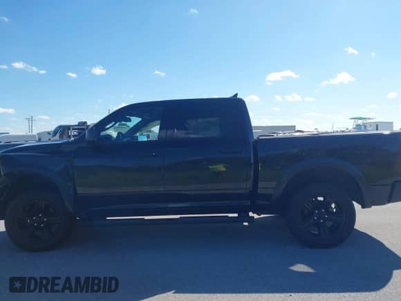 2022 Ram 1500 Warlock with VIN 1C6RR7LG4NS176356, listed as a IAAI auction lot 43423807 with 66,707 mi miles and . Bid and sale history available at DreamBid. Image 14.