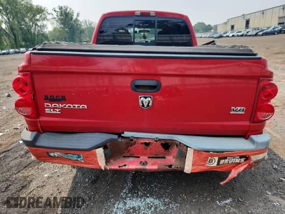 2005 Dodge Dakota SLT with VIN 1D7HW48N25S104161, listed as a Copart auction lot 67352895 with 126,288 mi miles and Salvage title. Bid and sale history available at DreamBid. Image 6.