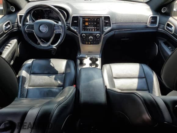 2014 Jeep Grand Cherokee Summit with VIN 1C4RJFJT4EC508994, listed as a Copart auction lot 66526655 with 107,657 mi miles and Salvage title. Bid and sale history available at DreamBid. Image 8.