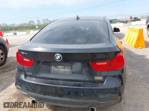2014 BMW 3 Series 335i Gran Turismo xDrive z VIN WBA3X9C52ED153321, wystawiony jako IAAI lot #42054040 z przebiegiem 145 150 mil mil oraz . Historia ofert i sprzedaży dostępna na DreamBid. Obrazek 16.