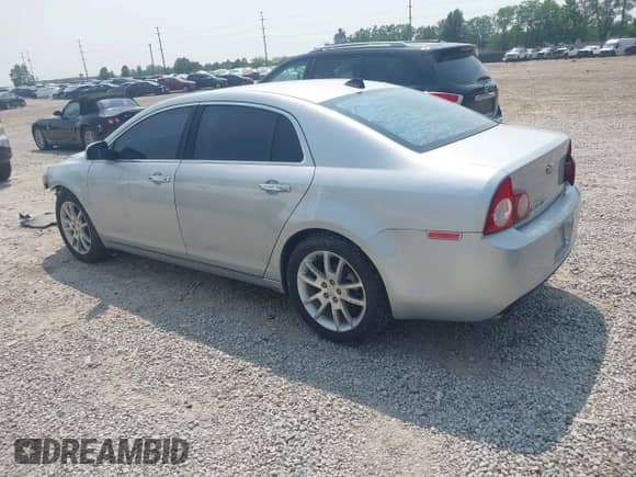 2012 Chevrolet Malibu LTZ z VIN 1G1ZG5E79CF205302, wystawiony jako IAAI lot #42416939 z przebiegiem 186 716 mil mil oraz . Historia ofert i sprzedaży dostępna na DreamBid. Obrazek 3.