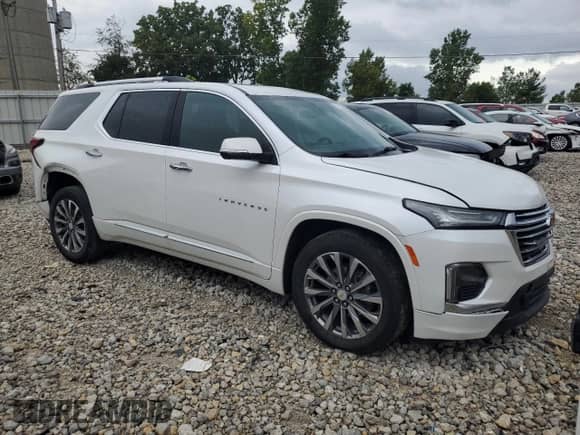 2023 Chevrolet Traverse Premier z VIN 1GNEVKKW6PJ295055, wystawiony jako Copart lot #67853075 z przebiegiem 74 072 mil mil oraz Szkoda całkowita • Salvage title. Historia ofert i sprzedaży dostępna na DreamBid. Obrazek 4.