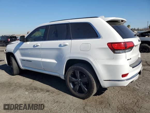 2015 Jeep Grand Cherokee High Altitude with VIN 1C4RJFCG0FC189854, listed as a Copart auction lot 62782515 with 126,933 mi miles and Salvage title. Bid and sale history available at DreamBid. Image 2.