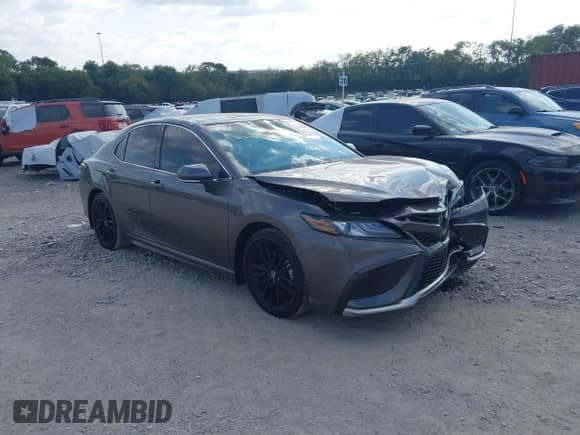 2023 Toyota Camry TRD with VIN 4T1KZ1AK1PU083876, listed as a IAAI auction lot 43378622 with 18,787 mi miles and . Bid and sale history available at DreamBid. Image 1.