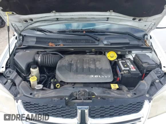 2014 Dodge Grand Caravan SXT with VIN 2C4RDGCG0ER152726, listed as a IAAI auction lot 43232494 with 162,088 mi miles and . Bid and sale history available at DreamBid. Image 10.