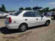 2002 Hyundai Accent GL z VIN KMHCG45C12U343720, wystawiony jako Copart lot #63329455 z przebiegiem 158 251 mil mil oraz Szkoda całkowita • Salvage title. Historia ofert i sprzedaży dostępna na DreamBid. Obrazek 3.