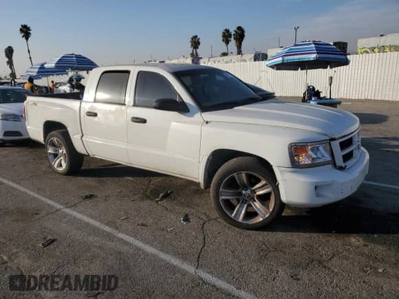 2011 Dodge Dakota с VIN 1D7RE3GP0BS602729, выставлен на аукционе Copart как лот 82971154 с пробегом 178 751 миль миль и Списание • Salvage title. История ставок и продаж доступна на DreamBid. Изображение 4.