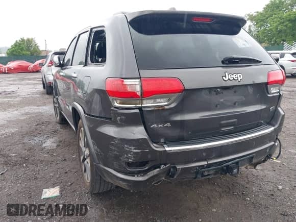 2018 Jeep Grand Cherokee Overland with VIN 1C4RJFCG3JC214710, listed as a IAAI auction lot 42264897 with Not provided miles and . Bid and sale history available at DreamBid. Image 17.