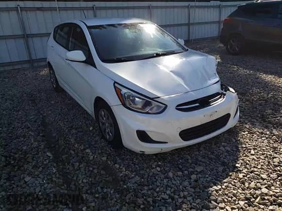 2015 Hyundai Accent GS z VIN KMHCT5AEXFU200439, wystawiony jako Copart lot #71659395 z przebiegiem 167 742 mil mil oraz Szkoda całkowita • Salvage title. Historia ofert i sprzedaży dostępna na DreamBid. Obrazek 13.