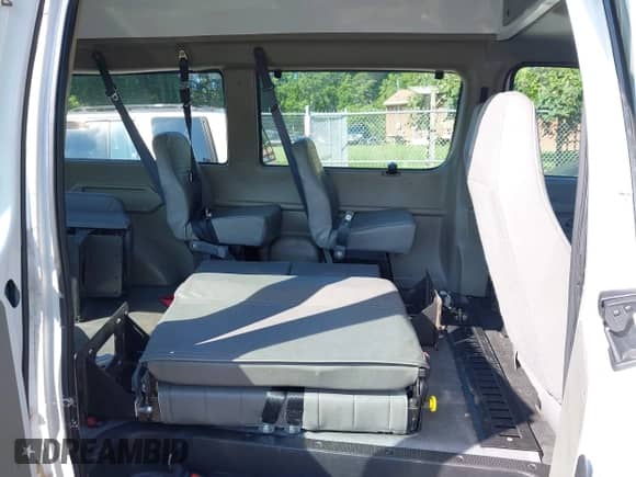 2002 Ford Econoline Cargo with VIN 1FTNE242X2HA90857, listed as a IAAI auction lot 42716391 with 103,796 mi miles and . Bid and sale history available at DreamBid. Image 8.