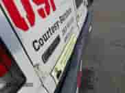 2004 Ford Econoline Cargo z VIN 1FTNE24LX4HA25275, wystawiony jako IAAI lot #43493442 z przebiegiem 291 424 mil mil oraz . Historia ofert i sprzedaży dostępna na DreamBid. Obrazek 14.