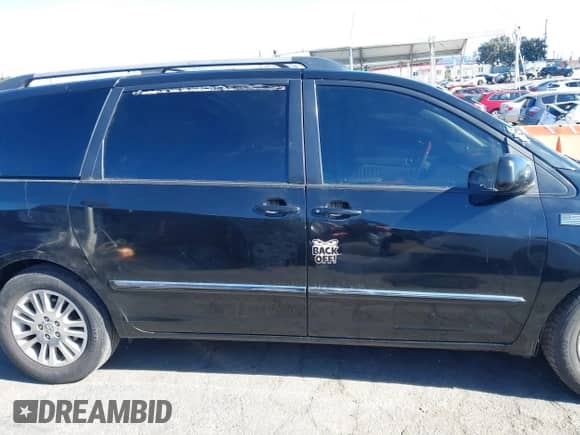 2009 Toyota Sienna XLE z VIN 5TDZK22C69S273555, wystawiony jako IAAI lot #41276221 z przebiegiem 129 160 mil mil oraz . Historia ofert i sprzedaży dostępna na DreamBid. Obrazek 13.