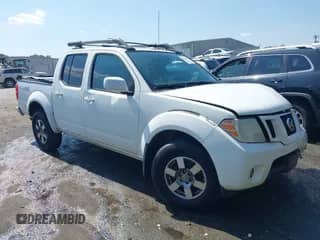 2011 Nissan Frontier Pro-4X z VIN 1N6AD0EVXBC450802, wystawiony jako IAAI lot #43276559 z przebiegiem 218 358 mil mil oraz . Historia ofert i sprzedaży dostępna na DreamBid. Obrazek 1.