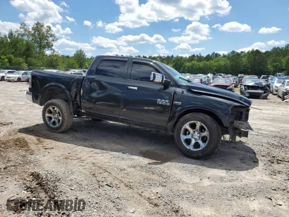 2017 Ram 1500 Laramie with VIN 1C6RR7NT1HS554096, listed as a Copart auction lot 56664455 with 157,369 mi miles and Salvage title. Bid and sale history available at DreamBid. Image 4.