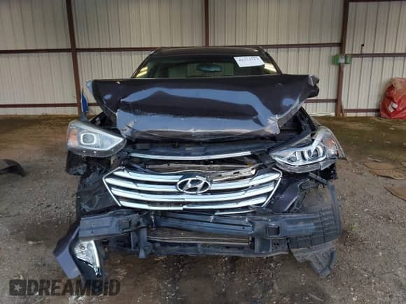 2016 Hyundai Santa Fe SE with VIN KM8SMDHFXGU154677, listed as a IAAI auction lot 42573713 with 173,434 mi miles and . Bid and sale history available at DreamBid. Image 12.