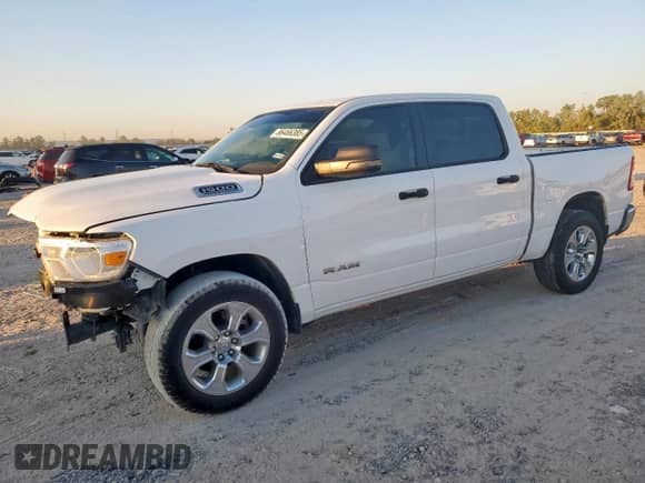 2023 Ram 1500 Lone Star z VIN 1C6SRFFT1PN692860, wystawiony jako Copart lot #86466385 z przebiegiem 57 407 mil mil oraz Szkoda całkowita • Salvage title. Historia ofert i sprzedaży dostępna na DreamBid. Obrazek 1.