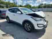 2016 Hyundai Santa Fe with VIN 5XYZU3LB2GG335212, listed as a Copart auction lot 65273225 with 107,801 mi miles and Salvage title. Bid and sale history available at DreamBid. Image 4.