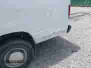 2006 Ford Econoline Cargo z VIN 1FTNS24W66HA70249, wystawiony jako IAAI lot #42640057 z przebiegiem 105 211 mil mil oraz . Historia ofert i sprzedaży dostępna na DreamBid. Obrazek 12.