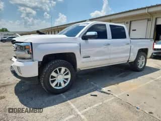 2017 Chevrolet Silverado 1500 High Country с VIN 3GCUKTEC3HG348141, выставлен на аукционе Copart как лот 60825425 с пробегом 88 429 миль миль и Списание • Salvage title. История ставок и продаж доступна на DreamBid. Изображение 1.