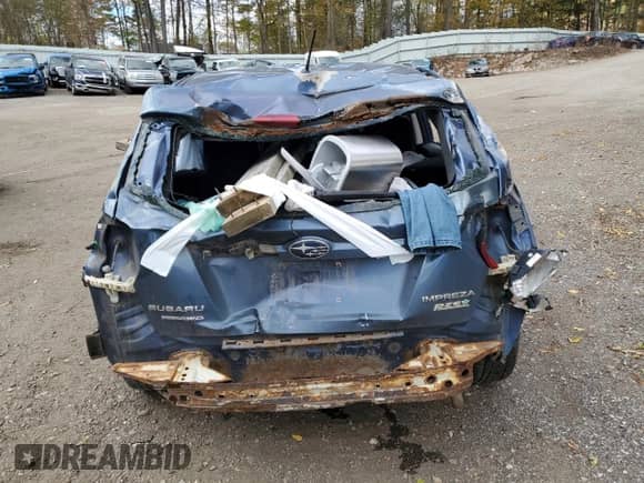 2013 Subaru Impreza Premium z VIN JF1GPAC61DH212841, wystawiony jako Copart lot #86494985 z przebiegiem Nie podano mil oraz Szkoda całkowita • Salvage title. Historia ofert i sprzedaży dostępna na DreamBid. Obrazek 6.