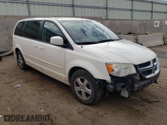 2013 Dodge Grand Caravan SXT with VIN 2C4RDGCG6DR575826, listed as a Copart auction lot 57378454 with 169,953 mi miles and Salvage title. Bid and sale history available at DreamBid. Image 4.