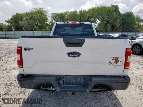 2018 Ford F-150 XL z VIN 1FTMF1CB4JKE40828, wystawiony jako Copart lot #63880405 z przebiegiem 102 605 mil mil oraz Czysty tytuł • Clean title. Historia ofert i sprzedaży dostępna na DreamBid. Obrazek 6.