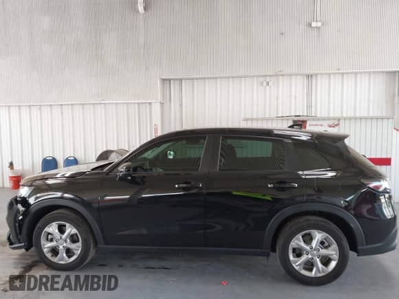 2025 Honda HR-V LX с VIN 3CZRZ1H30SM737050, выставлен на аукционе IAAI как лот 43313443 с пробегом 9 718 миль миль и . История ставок и продаж доступна на DreamBid. Изображение 14.