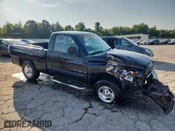 2000 Dodge 1500 with VIN 1B7HC16YXYS534782, listed as a Copart auction lot 66699915 with 185,726 mi miles and Clean title. Bid and sale history available at DreamBid. Image 4.