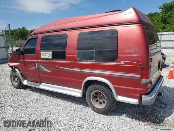 1999 Ford Econoline Cargo с VIN 1FDRE14W6XHB87930, выставлен на аукционе Copart как лот 56466655 с пробегом 215 881 миль миль и Списание • Salvage title. История ставок и продаж доступна на DreamBid. Изображение 2.