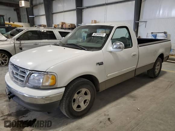 2001 Ford F-150 XL with VIN 1FTRF17W31NA23928, listed as a Copart auction lot 42345325 with 164,319 mi miles and Salvage title. Bid and sale history available at DreamBid. Image 1.