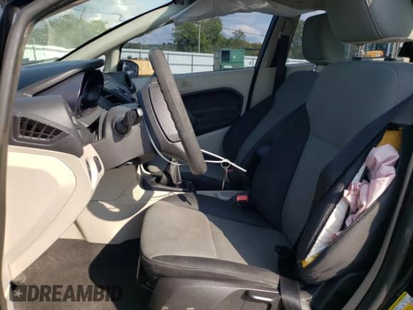 2012 Ford Fiesta S with VIN 3FADP4AJ8CM121345, listed as a Copart auction lot 70723125 with 113,935 mi miles and Salvage title. Bid and sale history available at DreamBid. Image 7.
