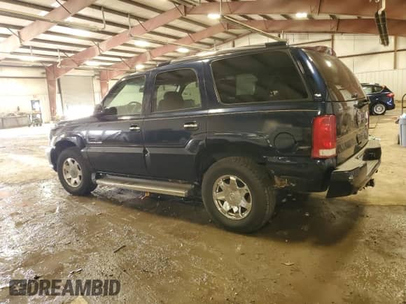 2005 Cadillac Escalade z VIN 1GYEK63N95R118054, wystawiony jako Copart lot #84563945 z przebiegiem Nie podano mil oraz Czysty tytuł • Clean title. Historia ofert i sprzedaży dostępna na DreamBid. Obrazek 2.