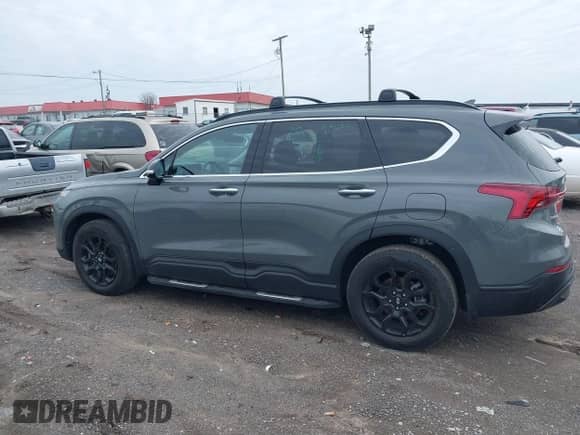 2022 Hyundai Santa Fe XRT with VIN 5NMS64AJ9NH403536, listed as a IAAI auction lot 41599114 with 15,585 mi miles and . Bid and sale history available at DreamBid. Image 14.